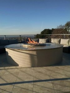 Stucco and granite fire pit with a great view of the Bay Area