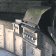 Outdoor kitchen in the San Jose area with grill, smoker, side burner and pizza oven