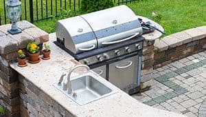 sink and stainless steel grill outside